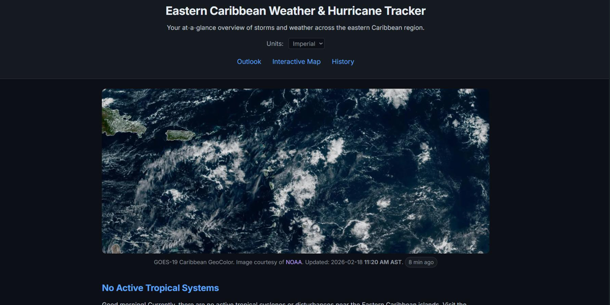 Dewedda.com v1.2.0 homepage in dark mode showing Caribbean satellite imagery, Interactive Map and History navigation links, and no active tropical systems status
